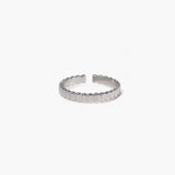 Block Line Ring in stainless steel with evenly spaced block segments and an adjustable open band