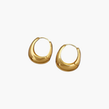 Bold Curve Hoop Earrings in 18k gold plated stainless steel with smooth curved silhouette.
