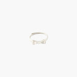 Minimalist bow knot ring with clean elegant design.