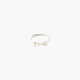 Minimalist bow knot ring with clean elegant design.