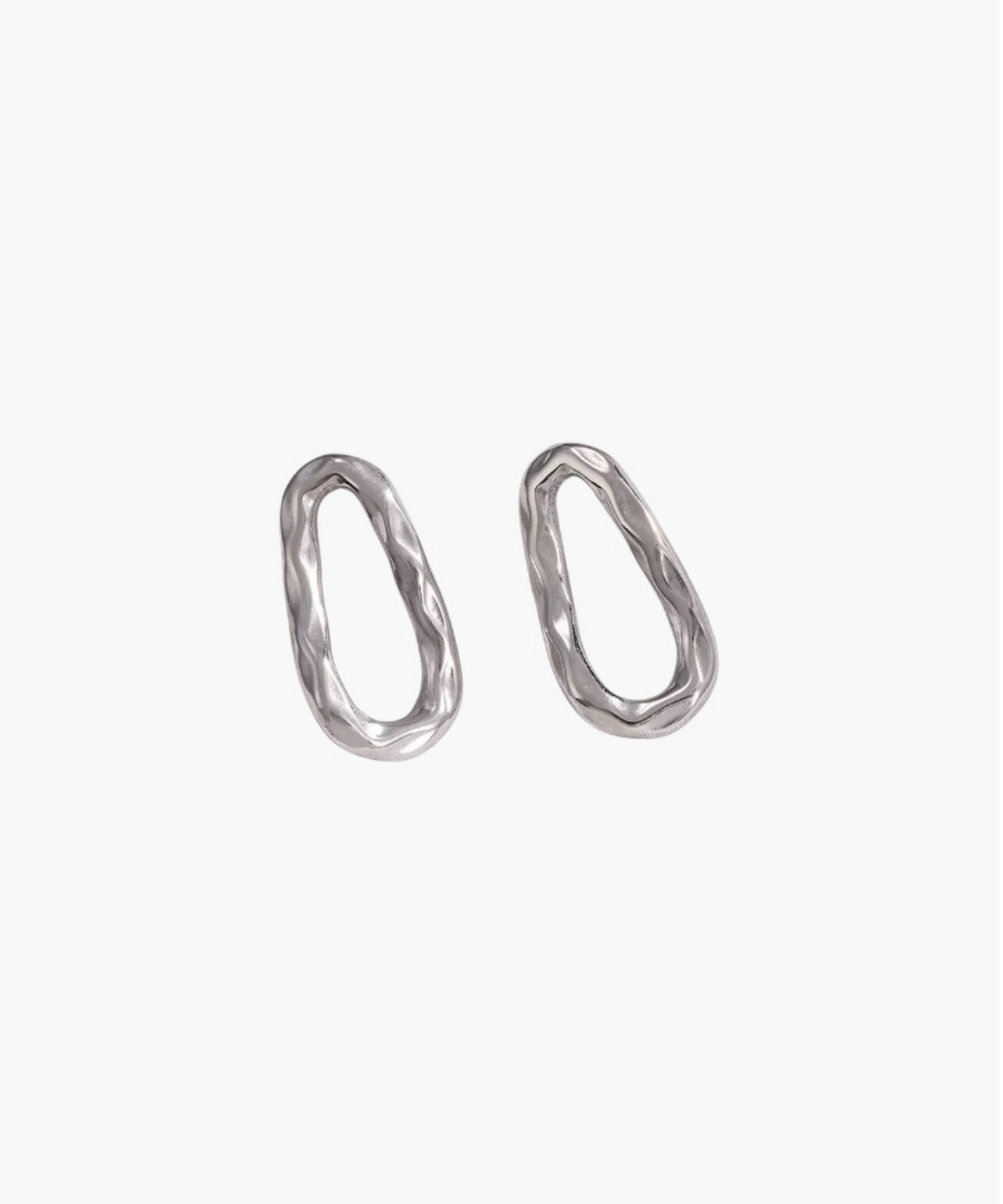 Calm Oval Earrings in stainless steel featuring an irregular textured oval silhouette.