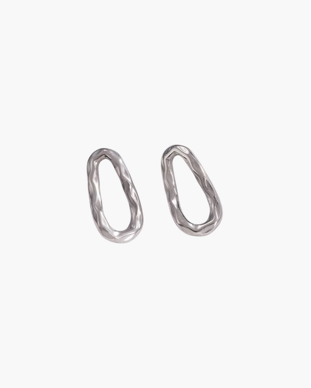 Calm Oval Earrings in stainless steel featuring an irregular textured oval silhouette.