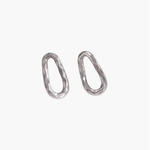 Calm Oval Earrings in stainless steel featuring an irregular textured oval silhouette.