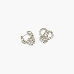 Compact Knot Earrings in stainless steel with sculptural interwoven knot detail.
