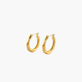 Contour Twist Hoop Earrings in 18K gold plated finish with a polished softly contoured hoop design.
