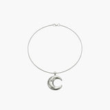 Minimalist crescent moon pendant necklace with smooth sculpted moon charm.