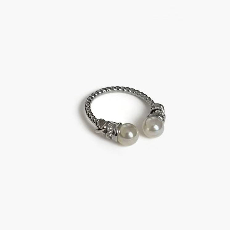 Double Pearl Ring in 925 silver plated finish with twin pearl details and an adjustable open band