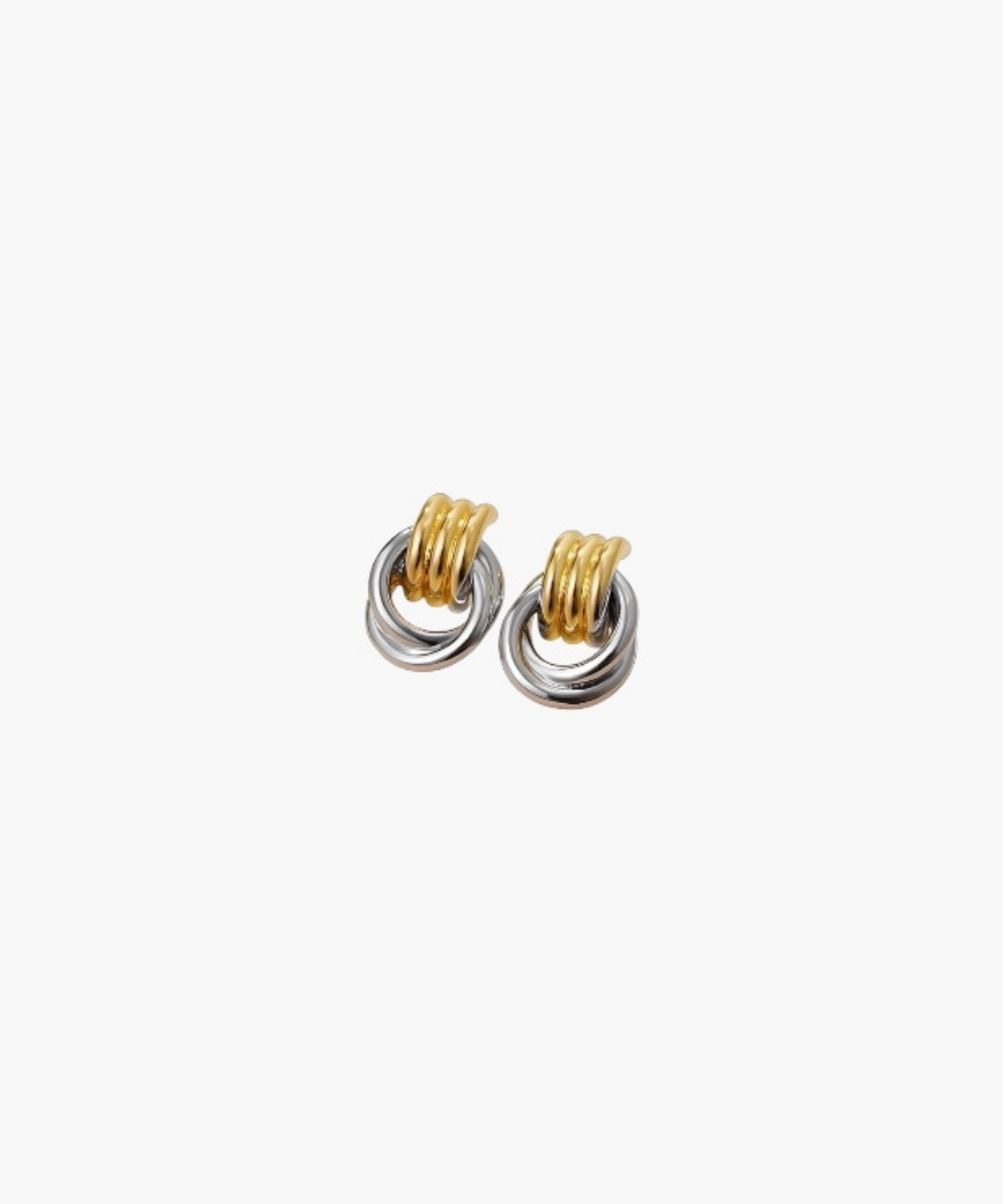 Angled view of Dual Interlink Hoop Earrings showcasing layered two-tone interlocking hoops with a modern polished finish.