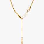 Gold pearl drop Y necklace with delicate chain and teardrop pendant detail.
