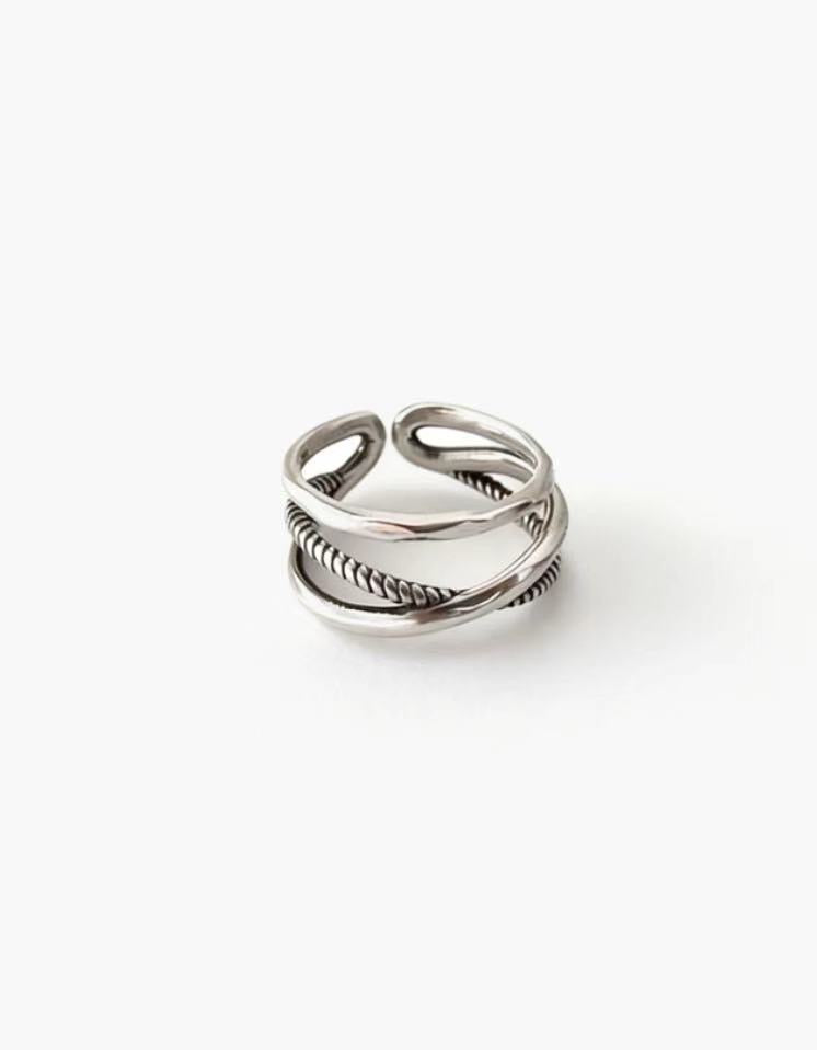 Layered 925 silver plated Interlace Ring featuring intersecting bands and a modern adjustable fit