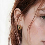Interlaced loop stud earrings in 18k gold plated finish, rounded polished minimalist layered gold earrings for women.