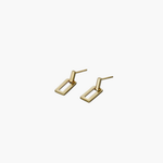 Gold linear frame drop earrings shown in angled view highlighting the open rectangular design.