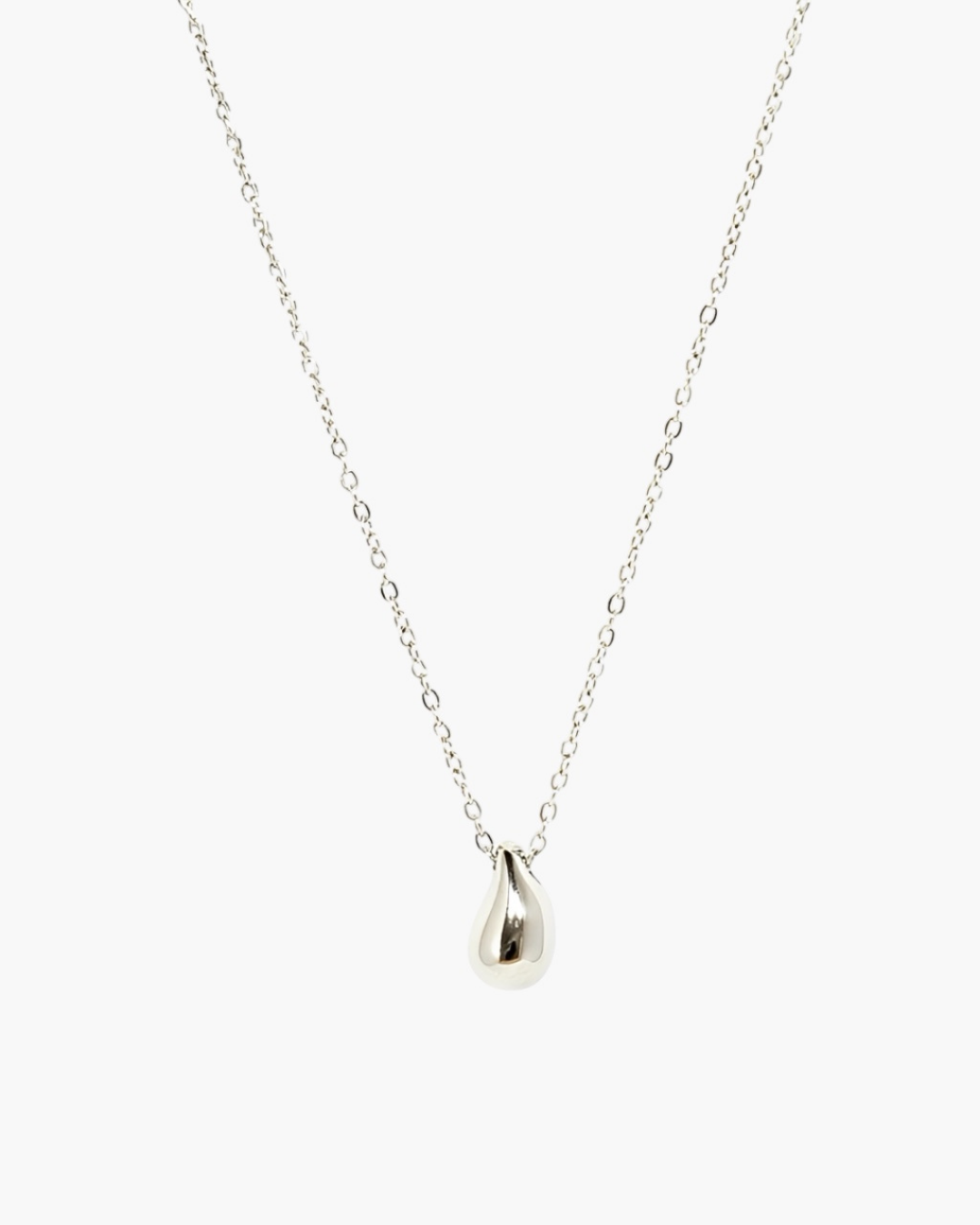 Minimal silver drop pendant necklace with smooth teardrop pendant on fine chain.
