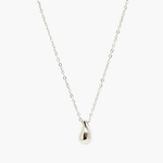 Minimal silver drop pendant necklace with smooth teardrop pendant on fine chain.
