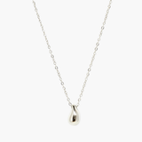 Minimal silver drop pendant necklace with smooth teardrop pendant on fine chain.
