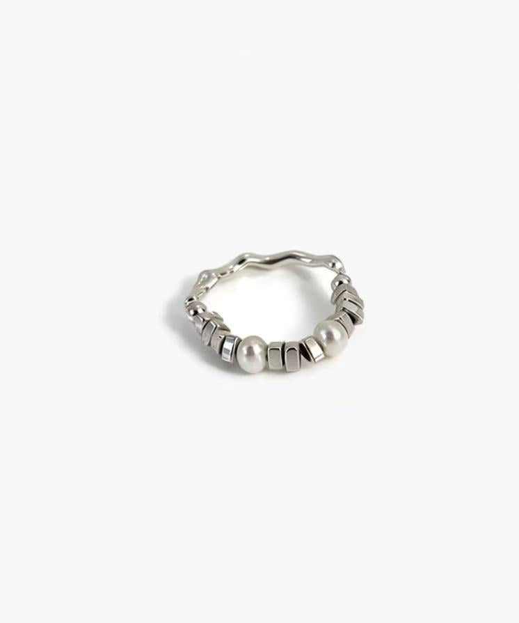 Mixed Form Ring in 925 silver plated finish with pearl accents and structured metal segments in an adjustable open design