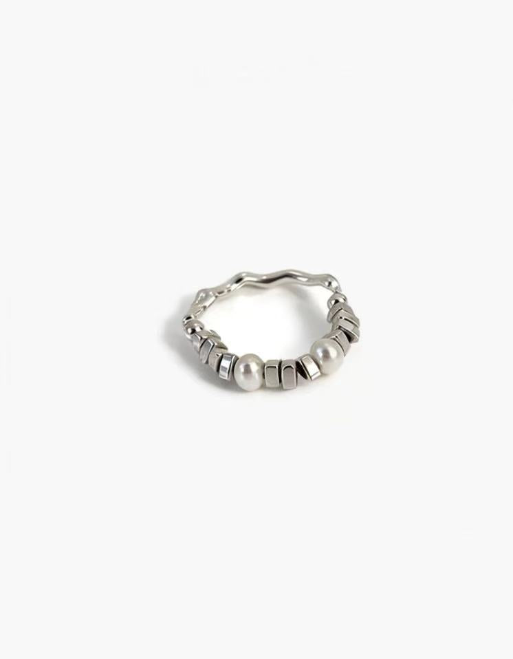 Mixed Form Ring in 925 silver plated finish with pearl accents and structured metal segments in an adjustable open design