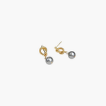 Modern Pearl Drop Earrings in 14k gold plated finish featuring a sculptural knot and gray pearl drop, angled view.