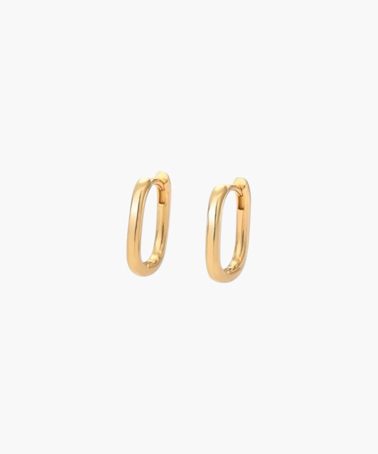 Oval Hoop Earrings in 18K gold plated finish with a slim polished oval silhouette for everyday wear.