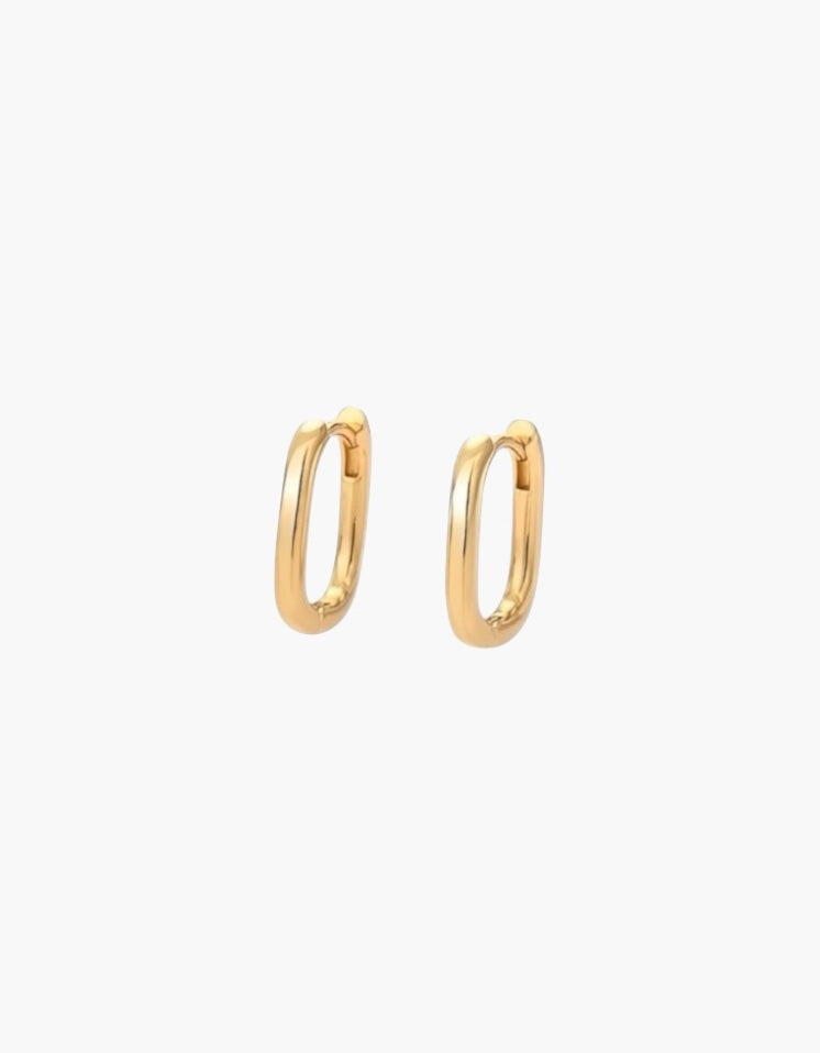 Oval Hoop Earrings in 18K gold plated finish with a slim polished oval silhouette for everyday wear.