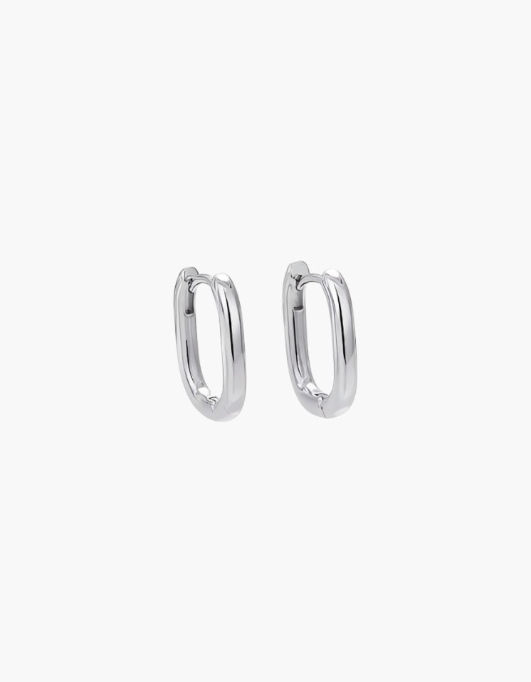 Oval Hoop Earrings in platinum plated finish featuring a sleek slim oval shape with high-polish shine.