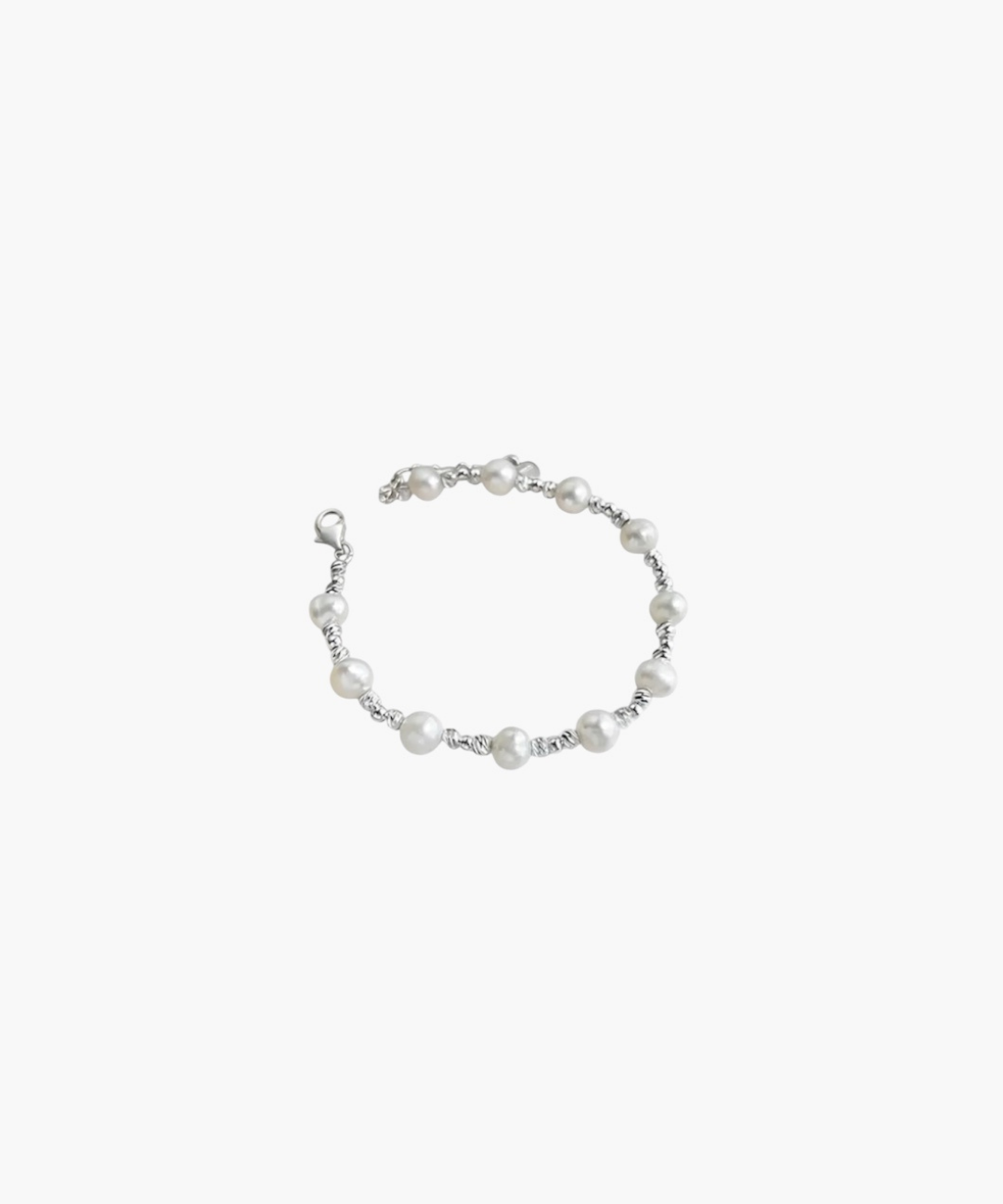 Minimal pearl interval bracelet with round shell pearls and 925 silver plated accents.