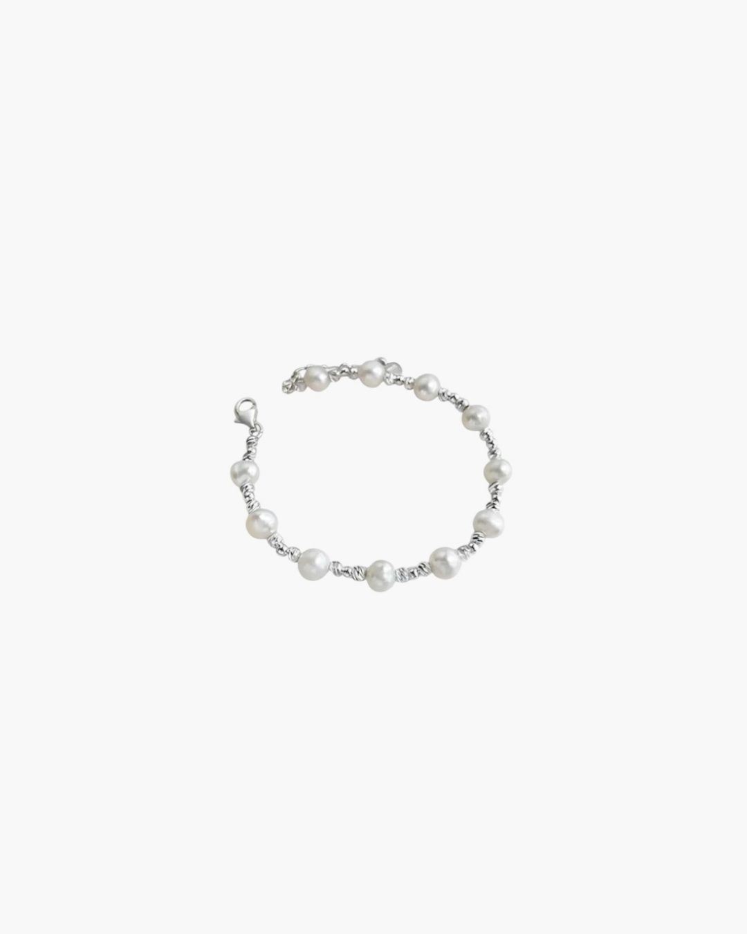 Minimal pearl interval bracelet with round shell pearls and 925 silver plated accents.