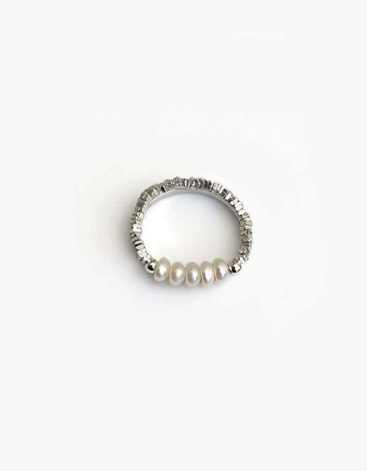 Pearl Line Ring in 925 silver plated finish with delicate pearl accents and an adjustable open band