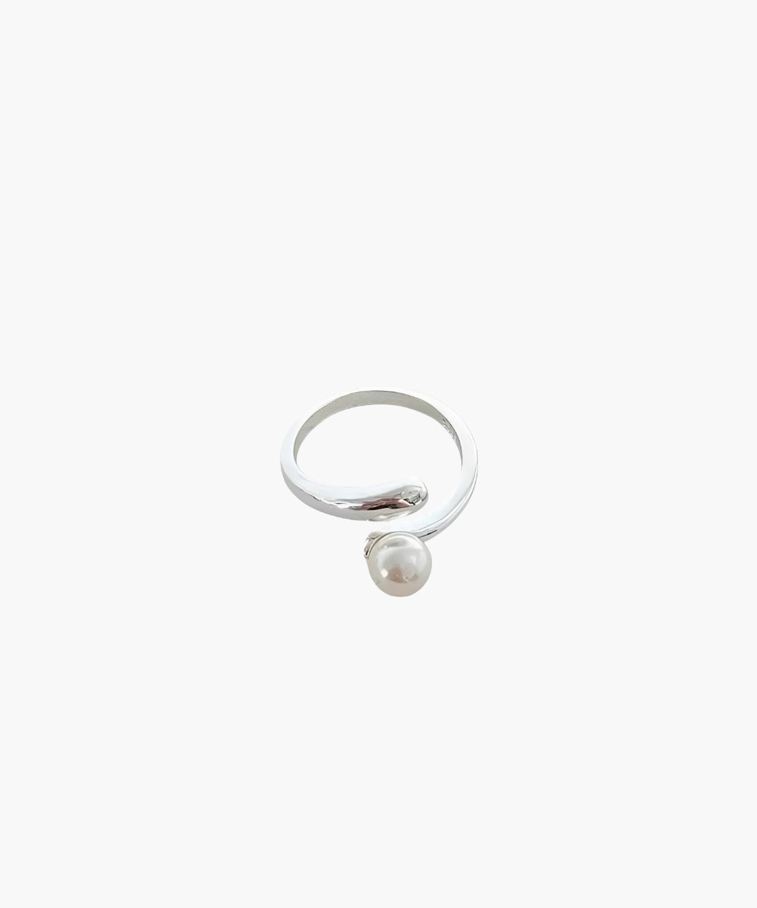Minimalist pearl wrap ring with elegant open band and pearl accent.
