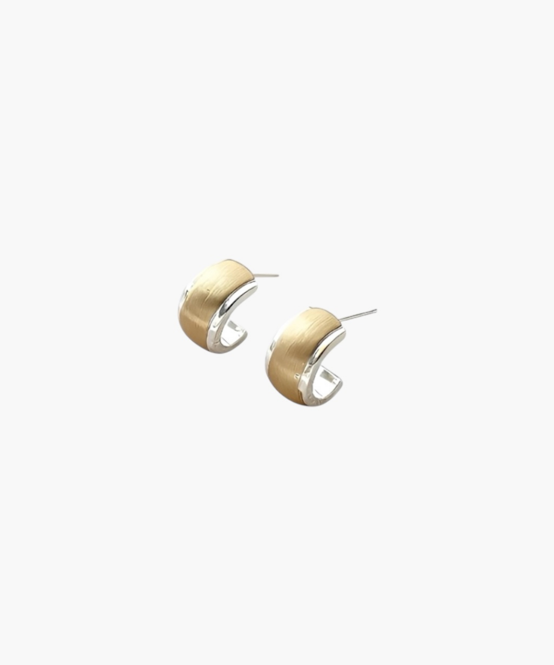 Quiet Curve Huggie Earrings in gold tone with brushed finish and polished edges, curved huggie style.