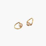 Quiet Pearl Hook Earrings in 14K gold plated finish featuring a single pearl drop on a soft curved hook design.
