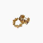 Ripple Form Hoop Earrings in 18k gold plated finish featuring sculptural ripple texture.
