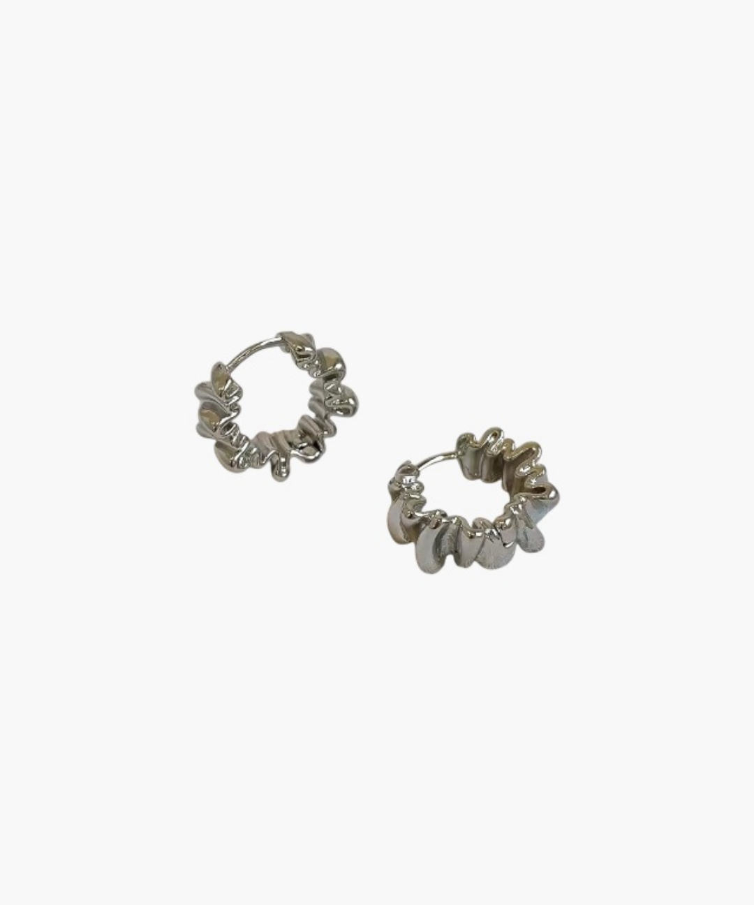 Ripple Form Hoop Earrings in silver plated finish with organic textured ripple design.
