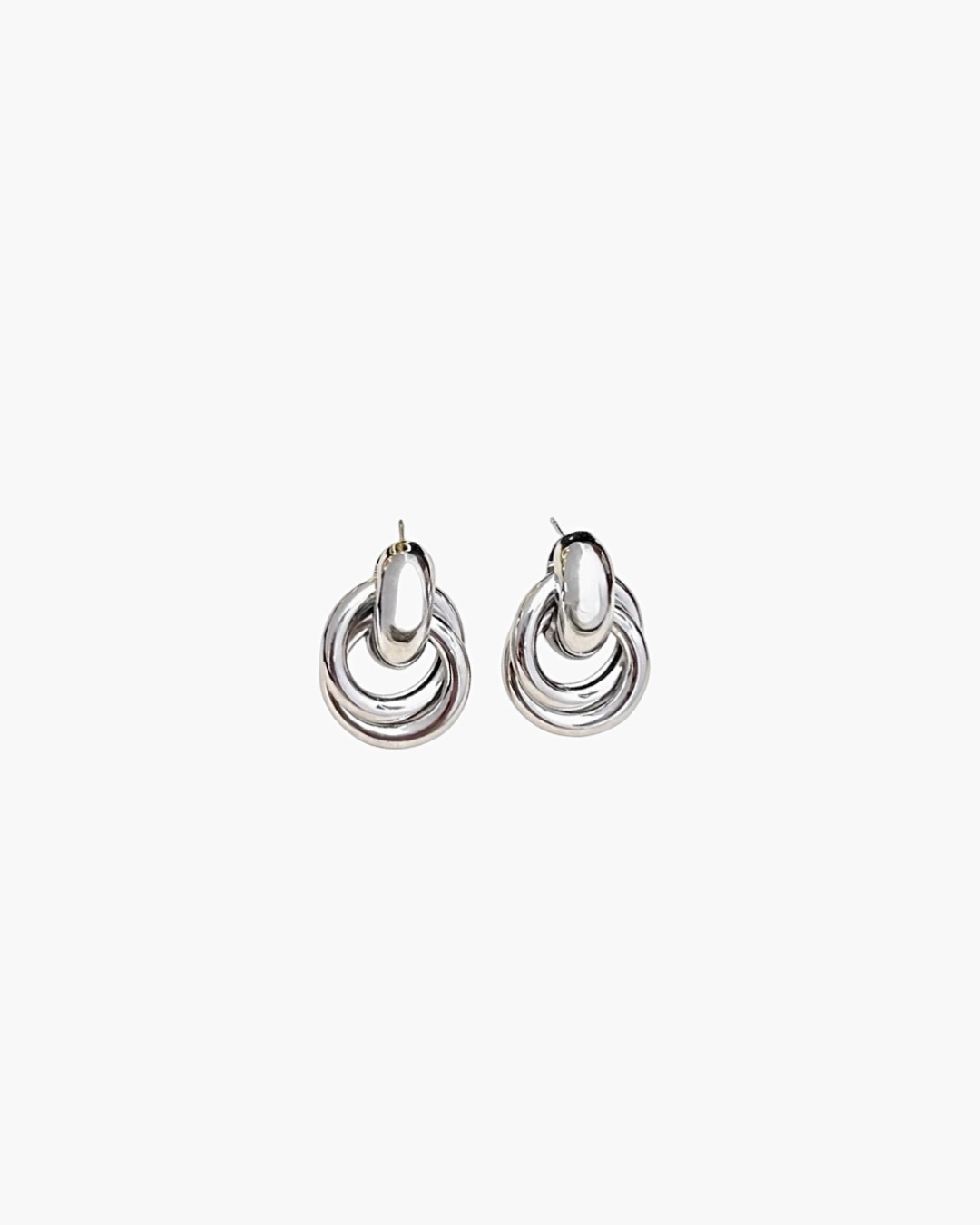 Sculpted interlock drop earrings in 925 silver plated finish featuring smooth polished layered loop design.