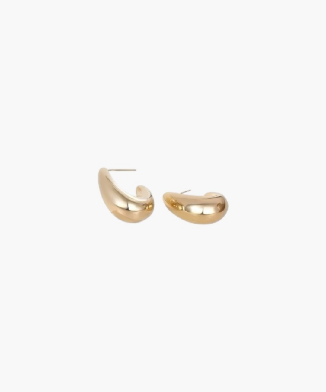Soft Curve Huggie Earrings in 14K gold plated finish with a sleek curved design and high-polish surface.