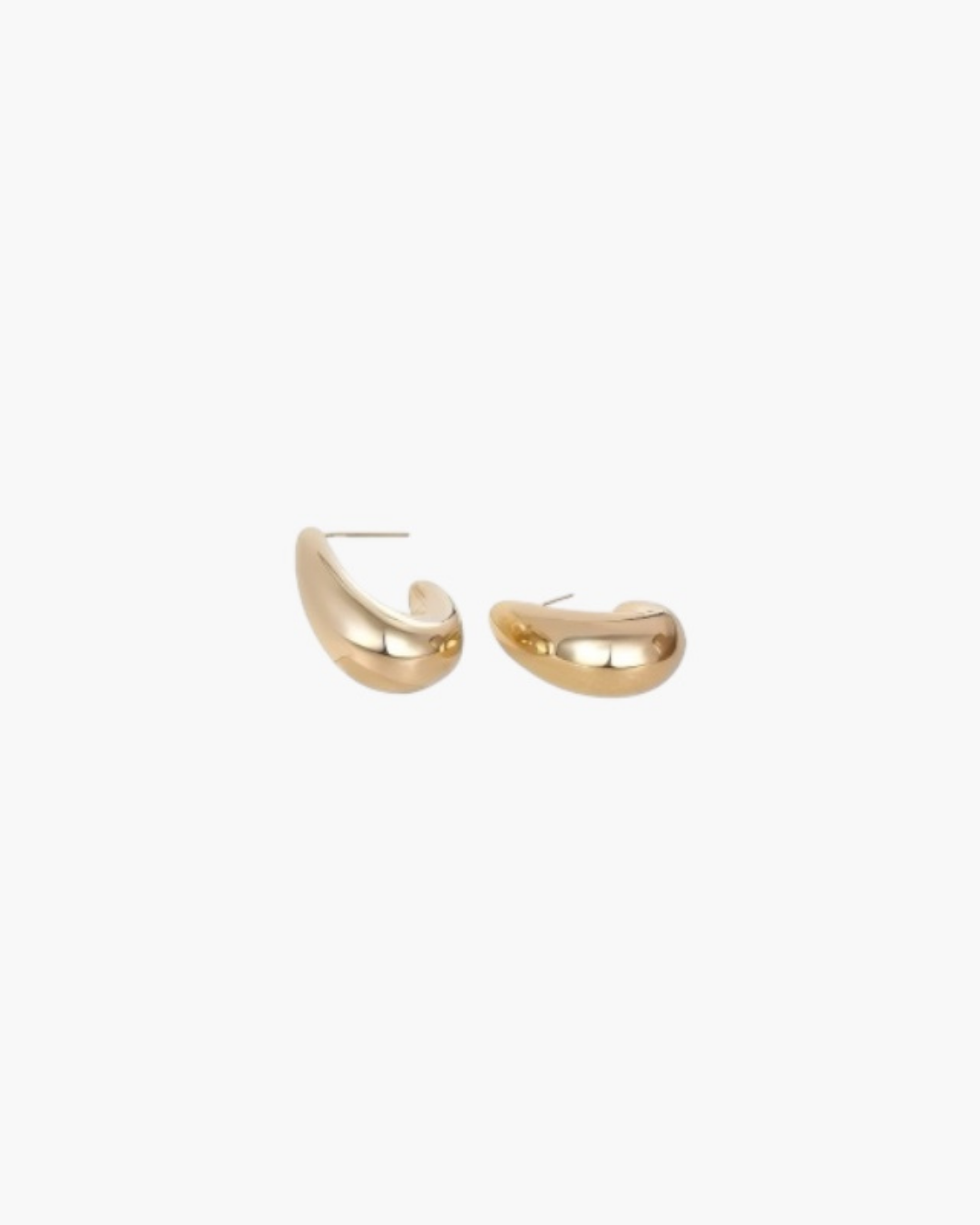 Soft Curve Huggie Earrings in 14K gold plated finish with a sleek curved design and high-polish surface.