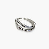 soft layer Ring in 925 silver plated finish with softly layered curves and an adjustable open design
