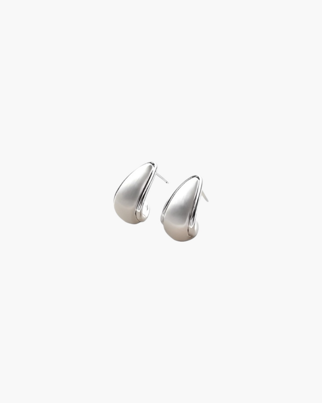Soft Sculpt Stud Earrings in silver tone with smooth curved silhouette and polished finish.