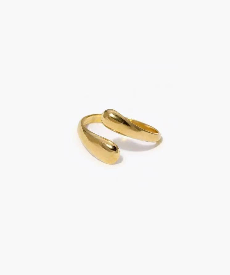 Soft Touch Ring in stainless steel with a smooth rounded open design and adjustable fit