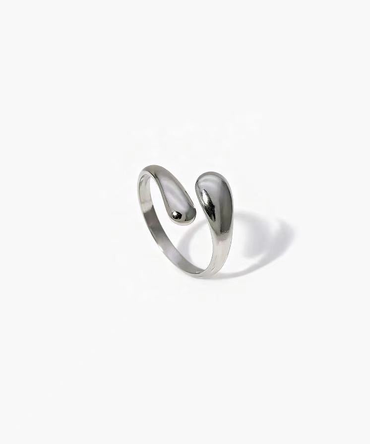 Soft Touch Ring in stainless steel with a smooth rounded open design and adjustable fit
