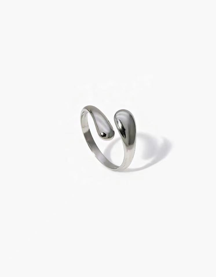 Soft Touch Ring in stainless steel with a smooth rounded open design and adjustable fit
