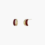Twist Accent Stud Earrings in 18k gold plated finish with bold red accent detail, front view.