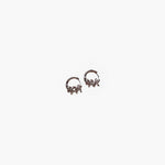 Twisted silver hoop earrings with spiral design minimalist small hoops front view