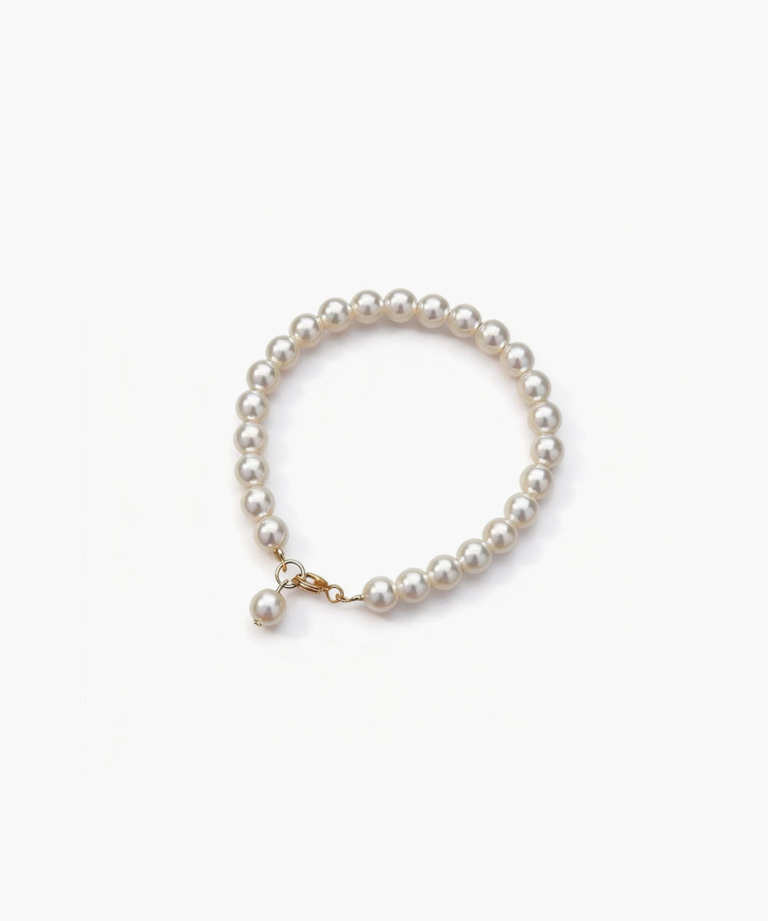 Minimal uniform pearl bracelet with gold accent by About Ease