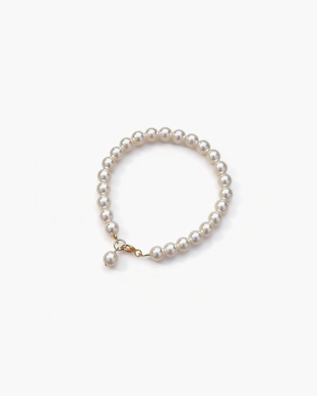 Minimal uniform pearl bracelet with gold accent by About Ease